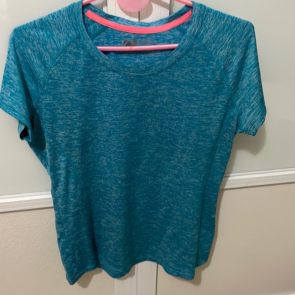 Great Dry fit T-shirt! Very flattering perfect for gym, etc.